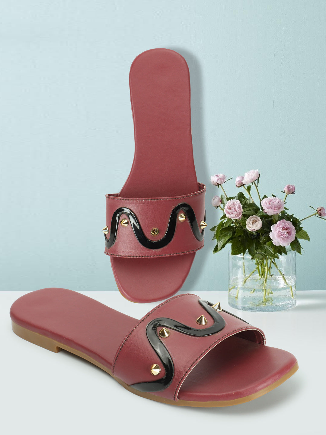 Sleek serpent flats, fierce fashion